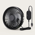 Black portable fan with USB cable on a light beige background