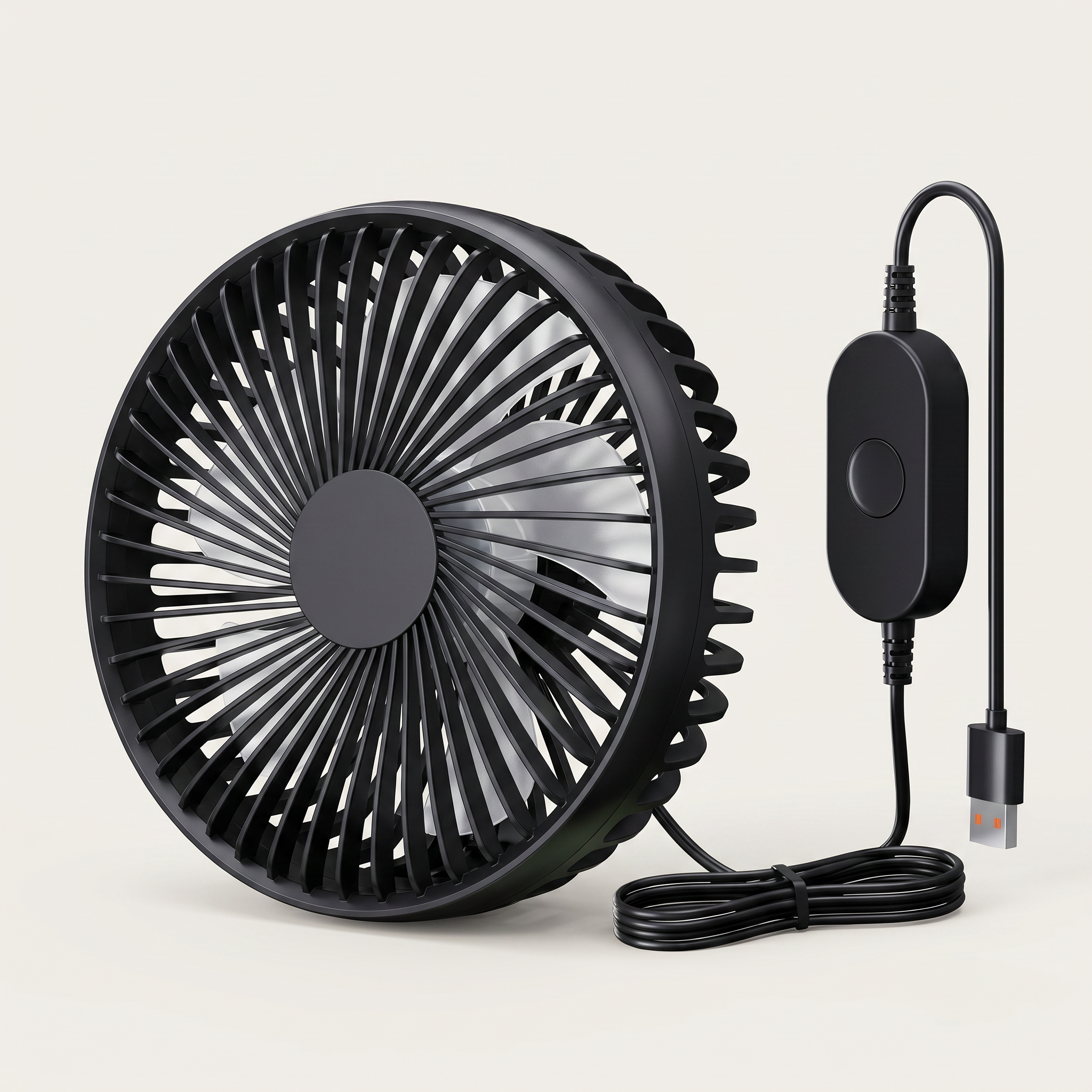 Black portable fan with USB cable on a light beige background