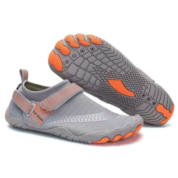 Gray and orange water shoes on a white background