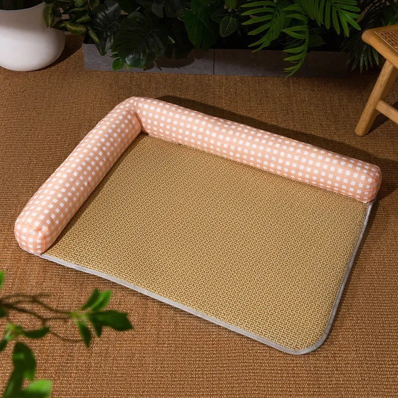 Pet bed with a textured surface and pink border on a brown floor.