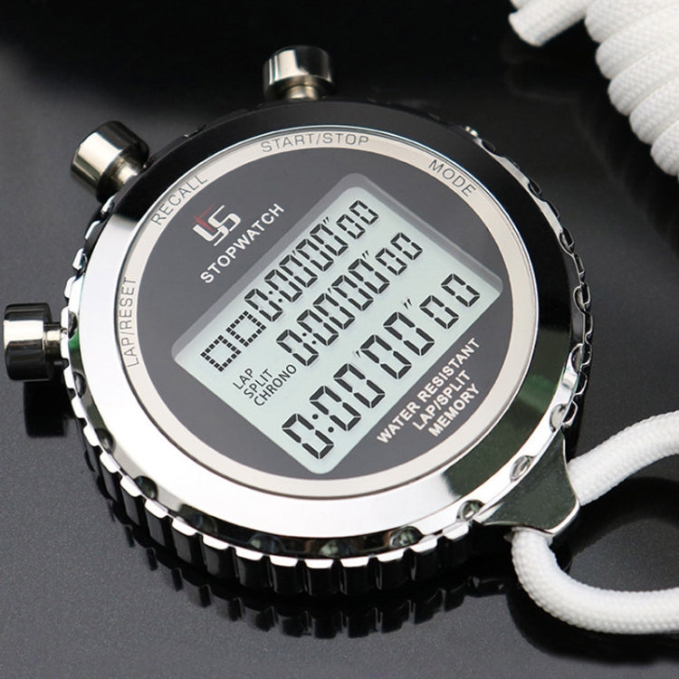 Digital stopwatch with a black face and silver casing on a dark background