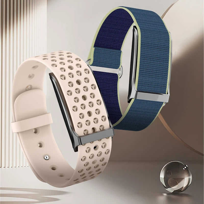Two watch straps, one beige with holes and one blue, on a neutral background.