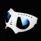 White goggles with blue-tinted lenses on a black background