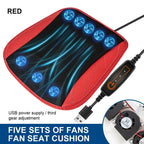 Red fan seat cushion with five blue fans and USB power supply on a white background