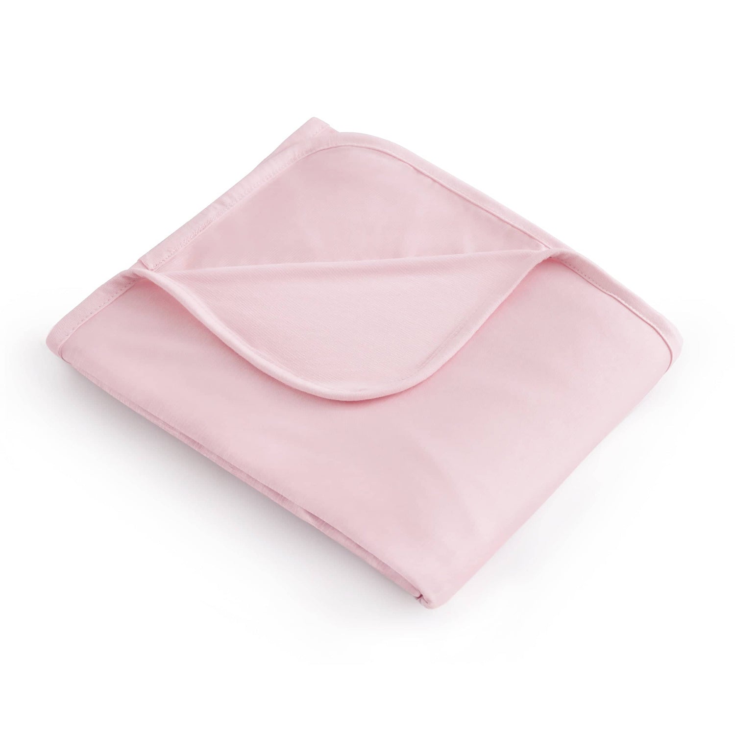 Pink blanket folded on a white background