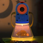 Children's robot toy with a light-up display featuring a bear and fish in a dark setting