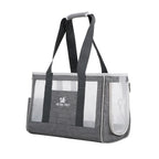 Gray pet carrier with transparent sides on a white background