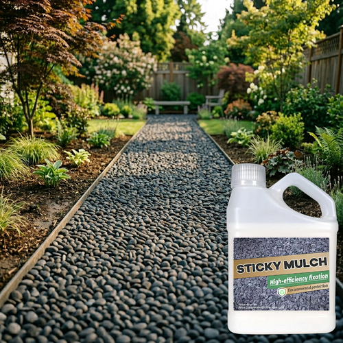 Container of 'Sticky Mulch' with a garden pathway and plants in the background