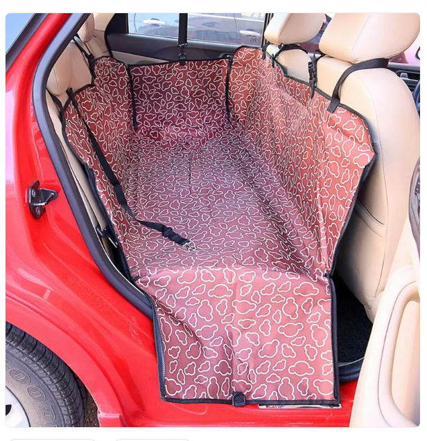 Pet car seat cover with a leopard print pattern installed in a vehicle.