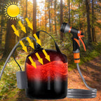Black water tank with orange nozzle and hose against a forest background