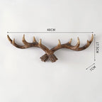 Decorative deer antlers with measurements on a white background
