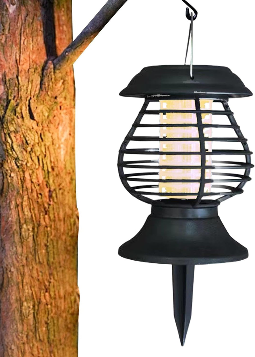 Black outdoor hanging light fixture attached to a tree