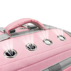 Close-up of a pink suitcase with silver handles and wheels on a white background