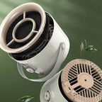 Two air filter components on a green background with leaves.