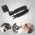 Guitar tool set with black components on a gray background