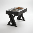 Pet feeding station with two bowls on a black stand against a white background