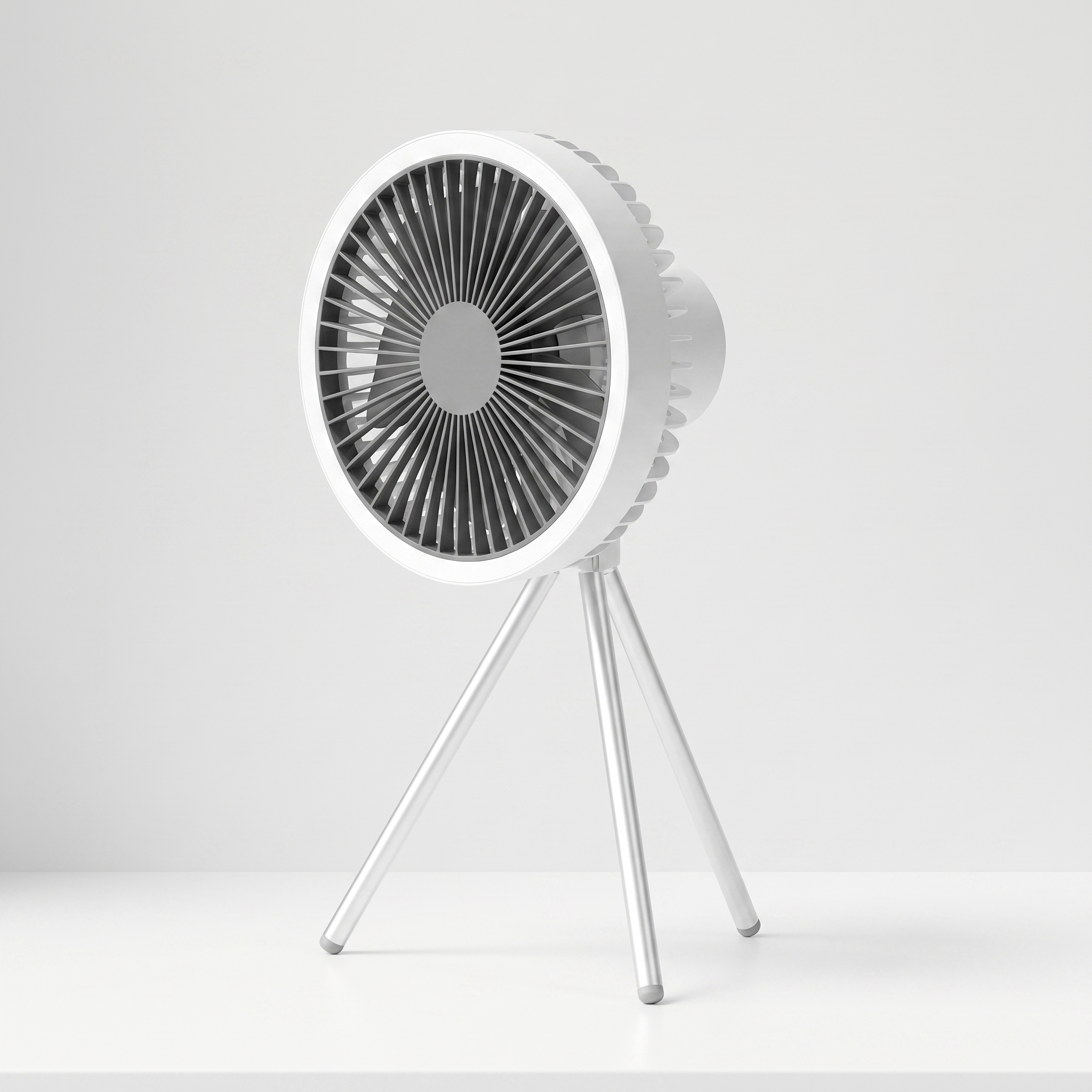 White portable fan on a light gray background