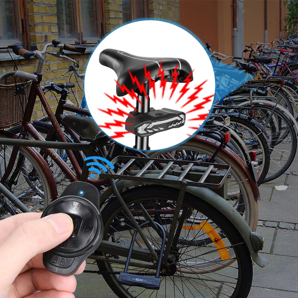 Bicycle lock with a remote control held by a hand, surrounded by bicycles in an outdoor setting.