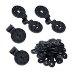 Black plastic components on a white background