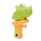 Toy gun with a green dinosaur-shaped barrel on a white background