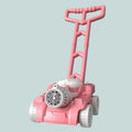 Pink toy lawn mower with a gray background
