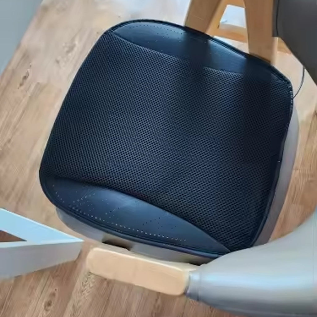 Black mesh cushion on a wooden chair