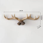 Decorative deer antlers with measurements on a white background