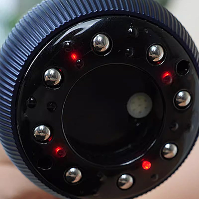 Close-up of a cylindrical device with LED lights on a blurred background