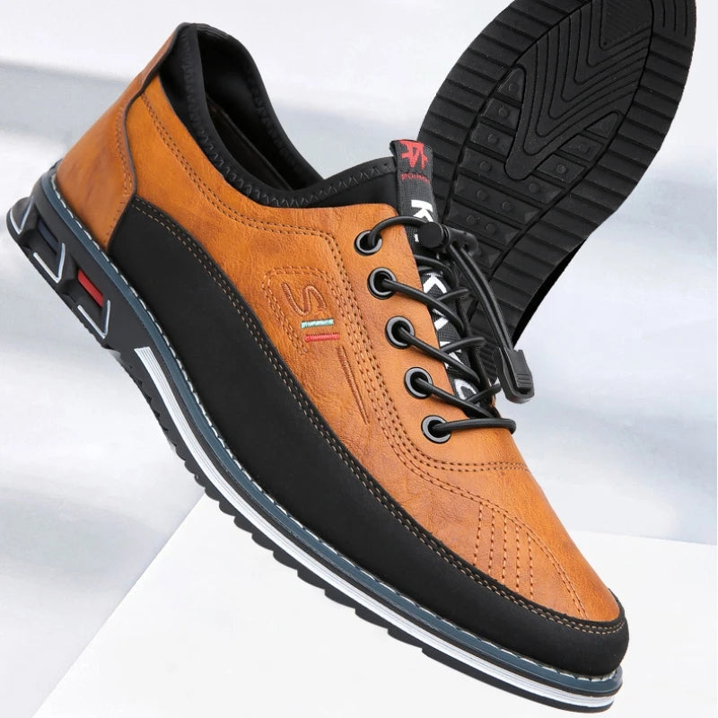 Brown and black leather shoe with brand logo on a light gray background