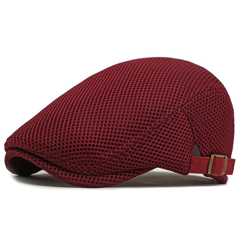 Red mesh cap with a strap on a white background