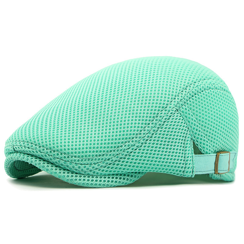 Mint green mesh cap on a white background