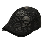 Black cap with skull and rose design on a white background