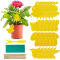 Set of yellow plant markers with a potted plant and tools on a white background