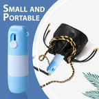Small and portable blue and white device with a black pouch on a blue background