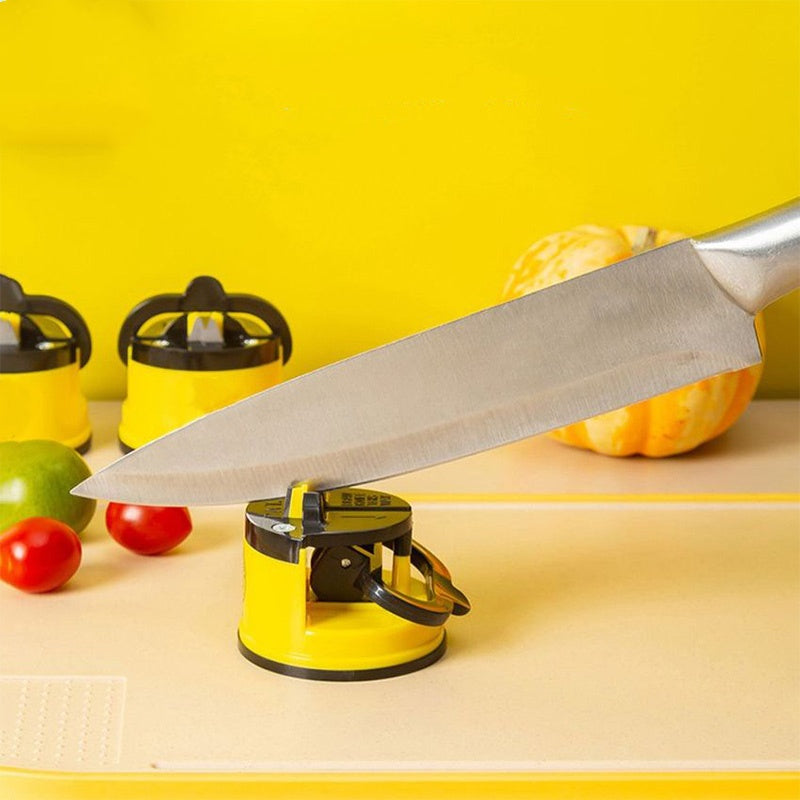 Knife sharpener with a knife on a yellow background