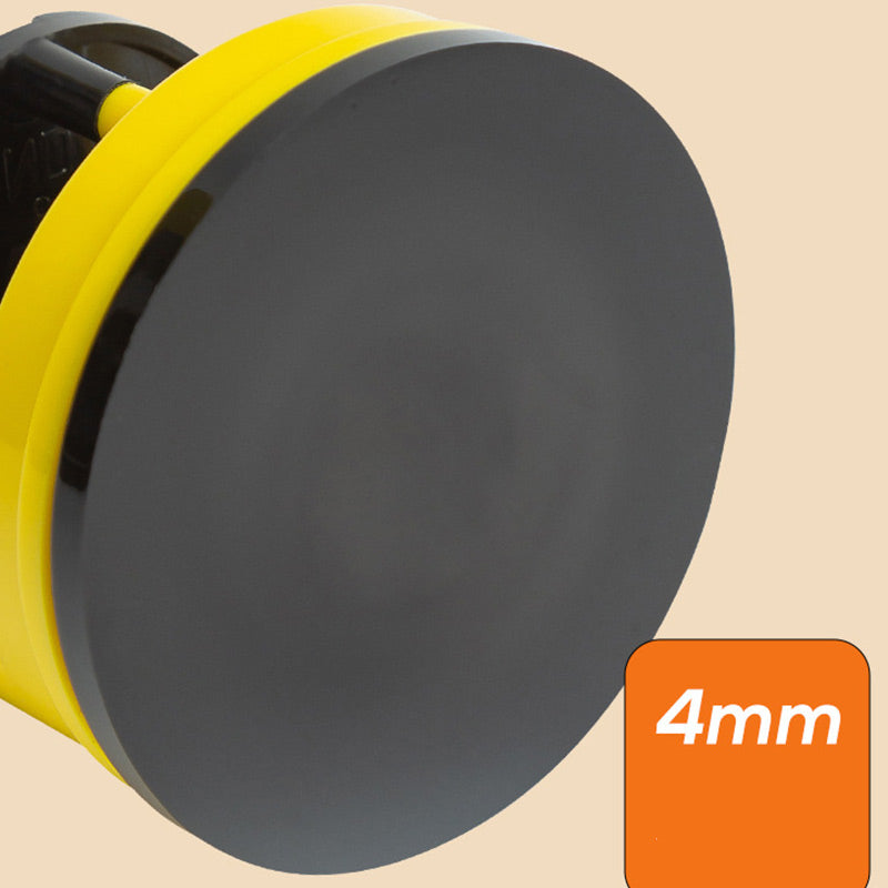 Black sanding disc with yellow holder and '4mm' label on a beige background