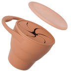 Brown silicone cup with lid on a white background