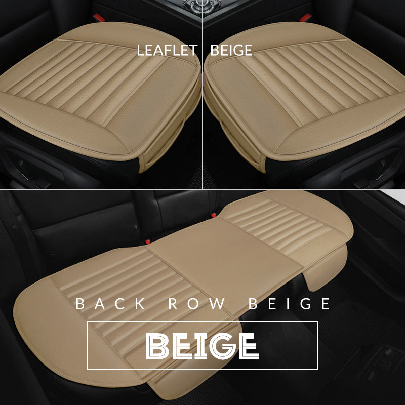 Beige car seat covers with 'Leaflet Beige' and 'Back Row Beige' labels on a black car interior background.