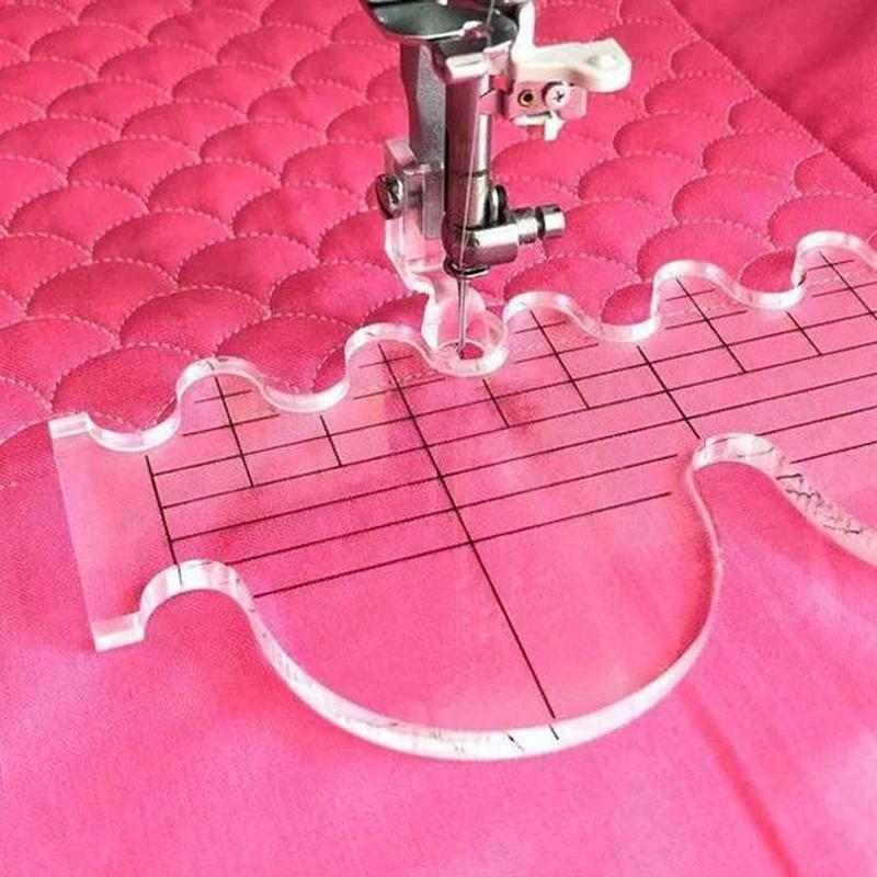 Quilting ruler on pink fabric with sewing machine needle