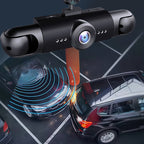 Car dashboard camera with a car in the background on a dark road.
