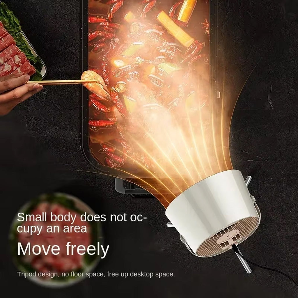 Small kitchen appliance being used to cook food on a dark surface.
