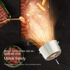 Small kitchen appliance being used to cook food on a dark surface.