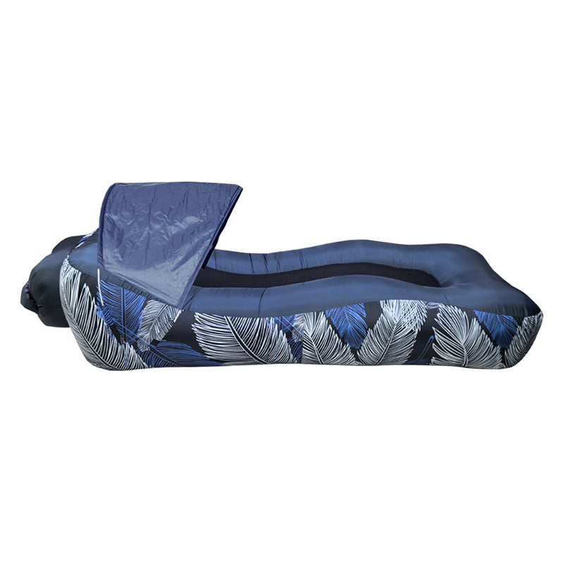 Inflatable lounge chair with blue and white feather pattern on a white background