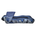 Inflatable lounge chair with blue and white feather pattern on a white background