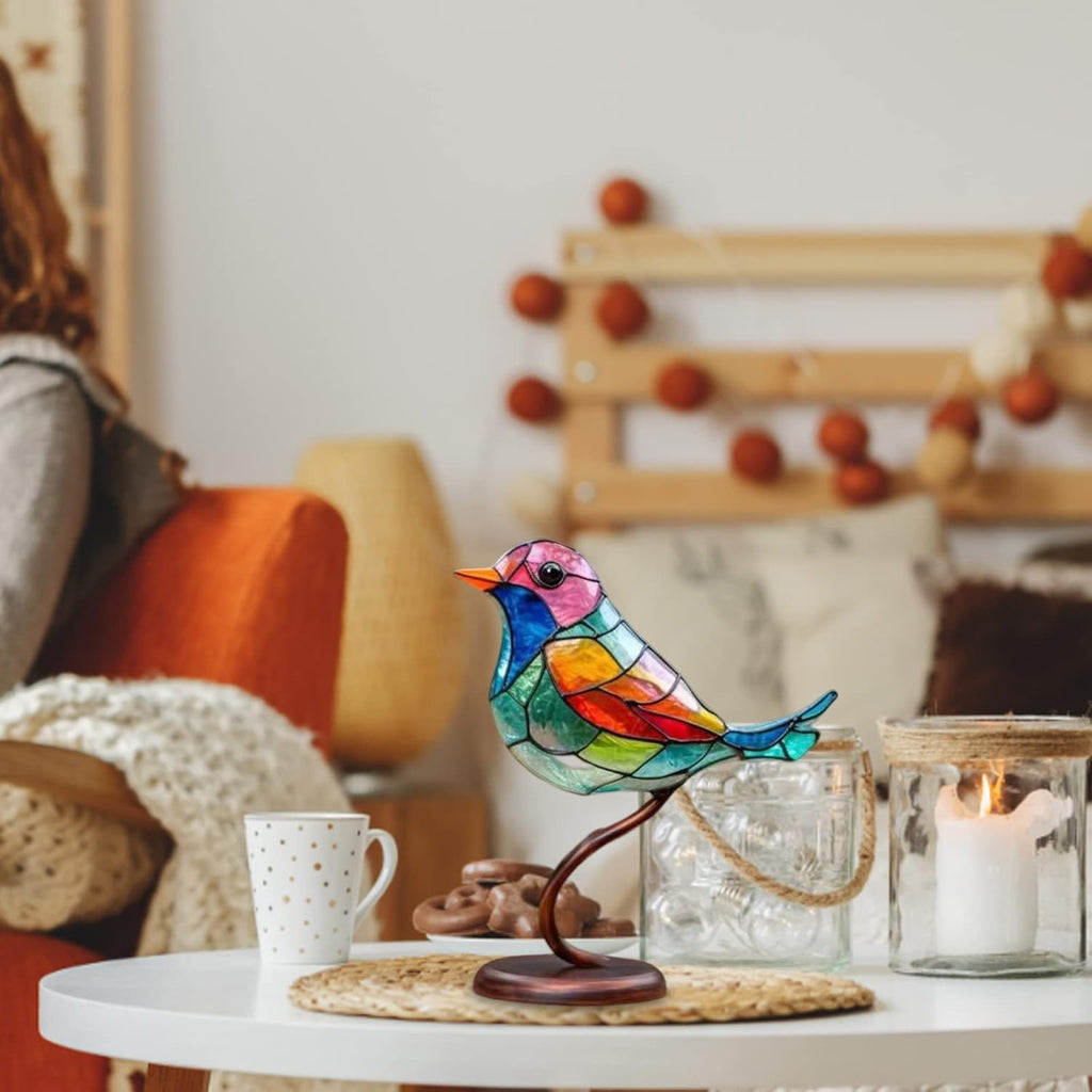 Colorful bird-shaped lamp on a table with a cozy living room background