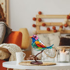 Colorful bird-shaped lamp on a table with a cozy living room background