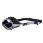 Dog muzzle with adjustable strap on a white background