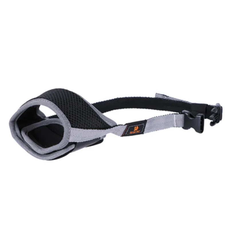 Dog muzzle with adjustable strap on a white background
