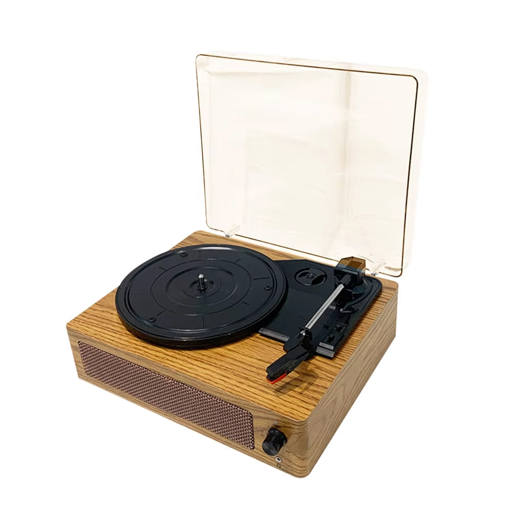 Wooden record player with transparent dust cover on a white background