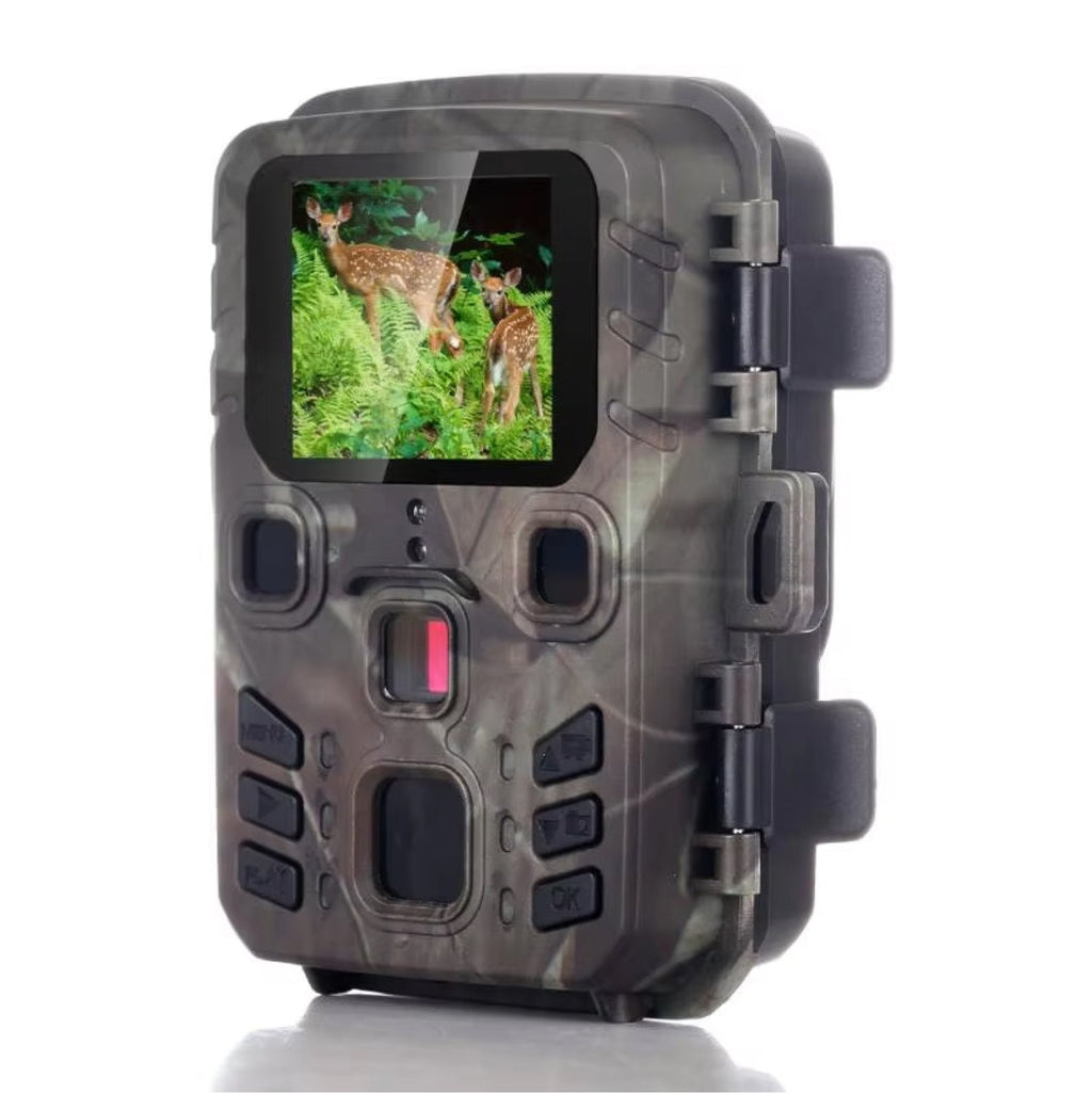 Camouflage-patterned wildlife camera with screen displaying deer in grass on a white background
